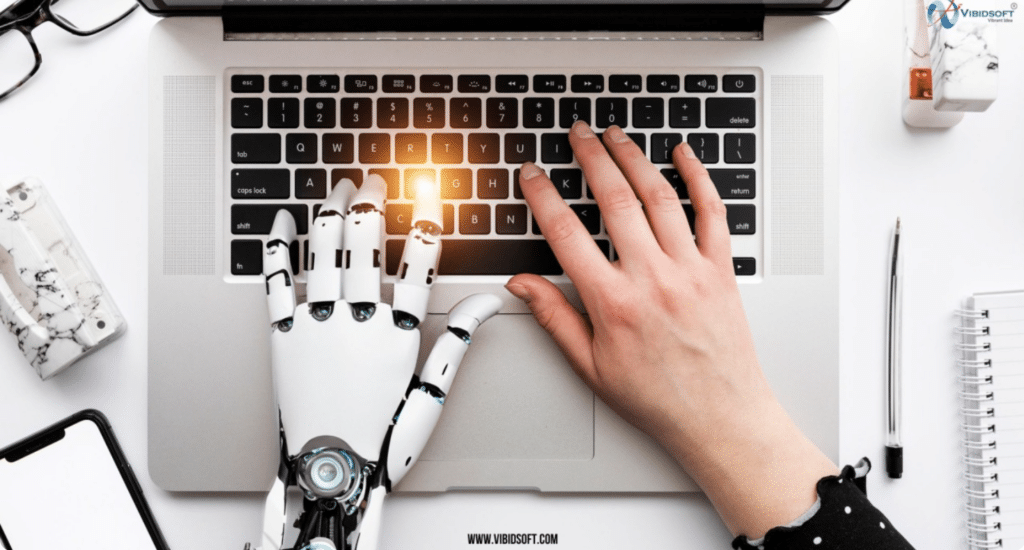 Robot & Human hands on keyboard